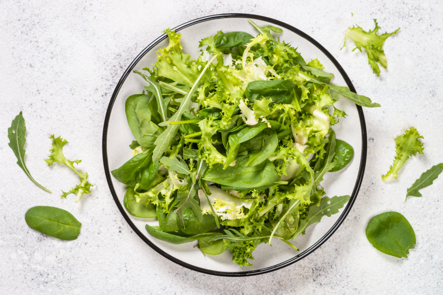 an arugula salad on a plate