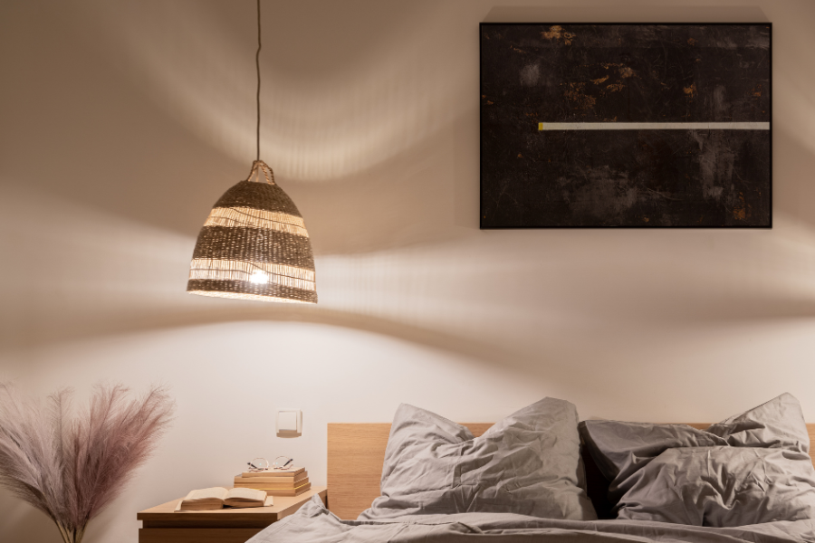 a bedroom with wall art