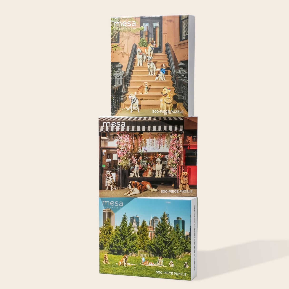 three jigsaw puzzles stacked on top of one another