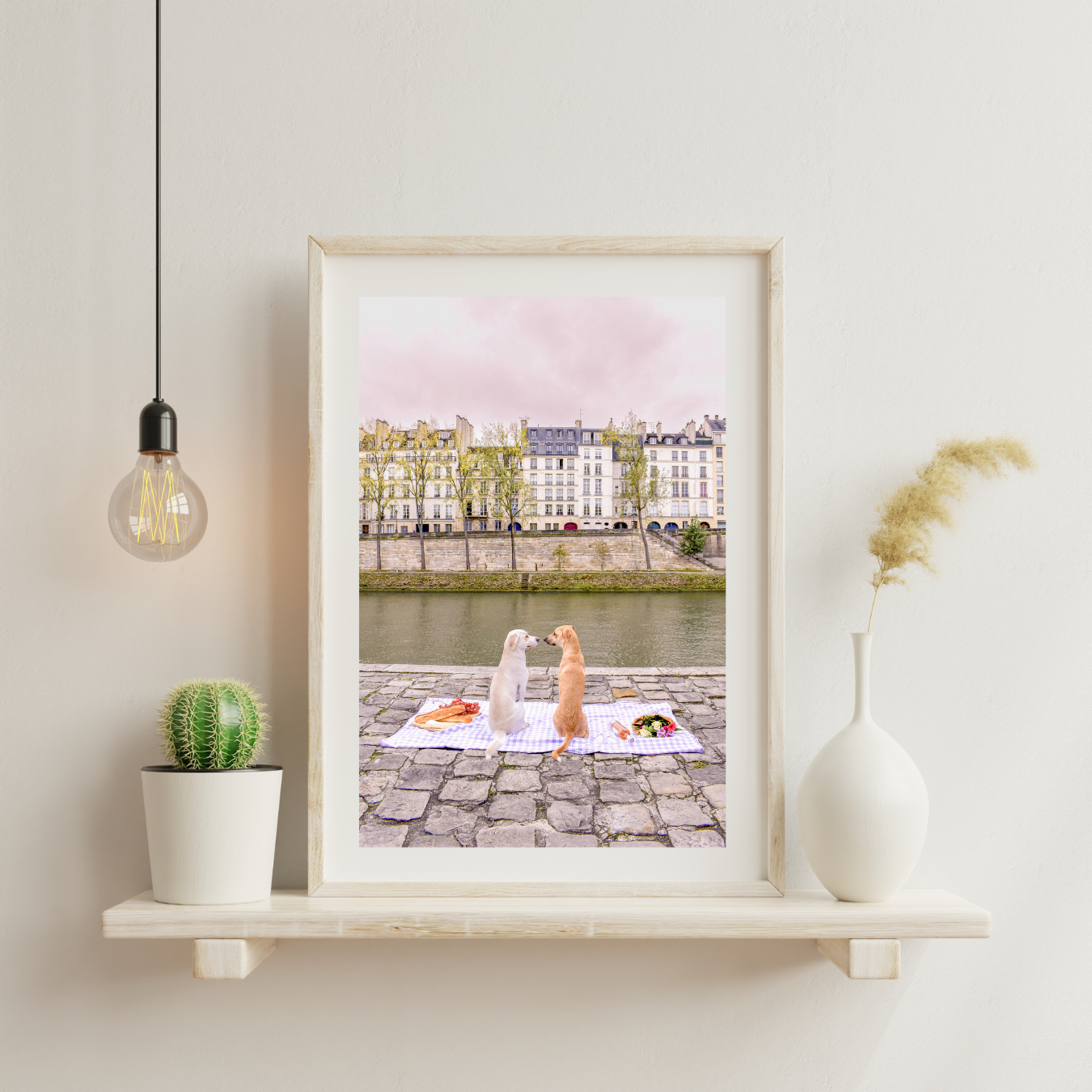 dog photo framed with light bulb next to it