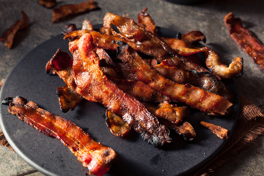 strips of bacon on a plate