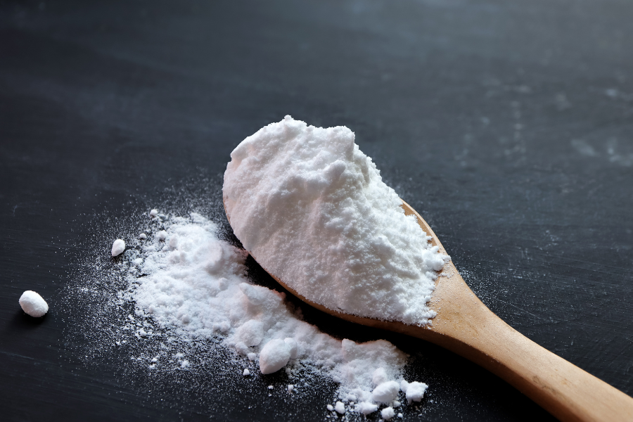 baking soda on a wooden spoon