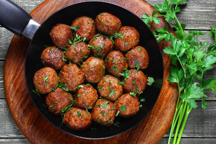 meatball for dogs with parsley next to it