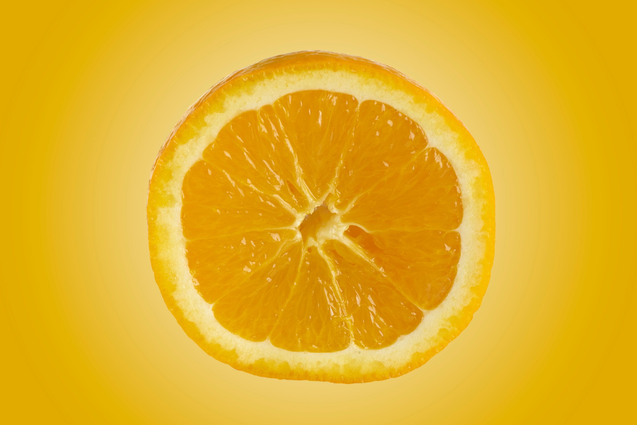 an orange on an orange background