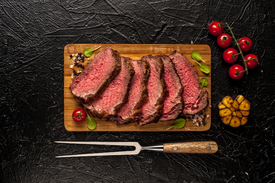 a steak cut into slices